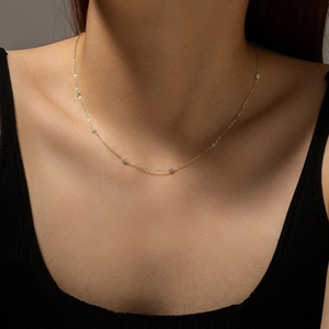 Minimalist S925 sterling silver gold necklace with sparkling round zircon accents for women