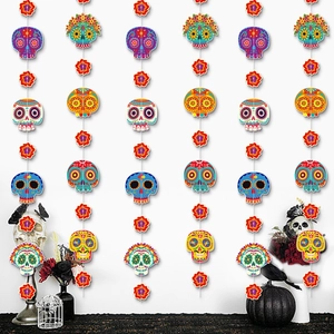 Colorful sugar skull and flower hanging decorations for Day of the Dead party setting