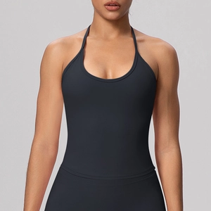 Front view of black halter neck yoga bra showing high-elastic fabric and U-neck detail