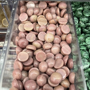 Close-up of smooth pink round stone beads and agate for DIY jewelry accessories