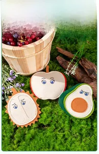 Detailed view of fruit-shaped felt cat toys with durian, apple, and avocado designs