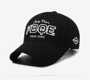 Detail of black cotton baseball cap with white 3D embroidery and curved brim