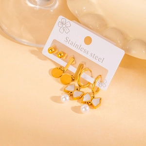 Three-pair gold stainless steel earrings set featuring pearls and enamel bows detail