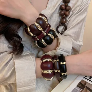 Retro acrylic beaded bracelet set in brown and gold tones for women's daily commute style