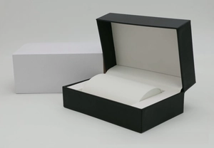 Detail view of premium PU leather watch gift box with white cushion and packaging box