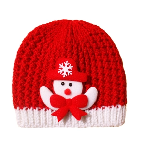 Detailed view of winter baby knit hat featuring a cute 3D snowman patch and red textures