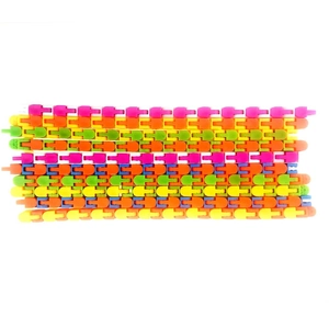 Close-up of colorful interconnected plastic wacky tracks links in various bright colors