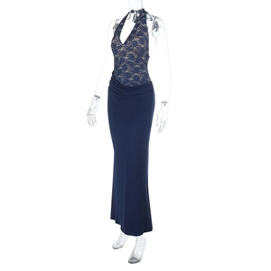 Detail of navy lace patchwork halter neckline on a flowy backless evening maxi dress