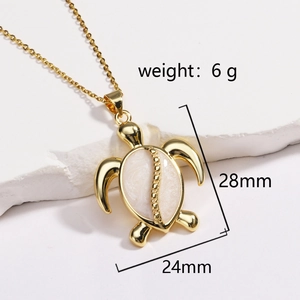 Detailed view of turtle pendant size 28mm by 24mm and weight 6g on stone background