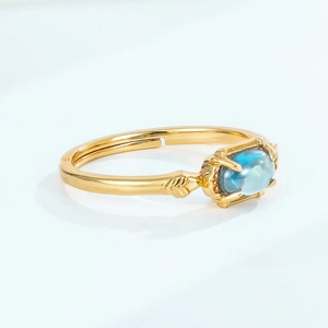 Vintage gold S925 silver ring with oval London blue topaz and ornate leaf patterns