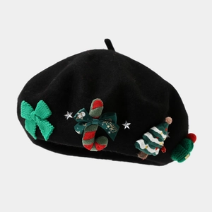 Black wool Christmas beret hat with festive green bow, candy cane and star decorations