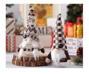 Detail of Christmas gnome storage jars with knitted hats and coffee bean glass bottles