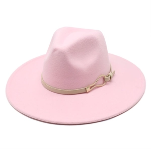 Detail of pink wide brim fedora hat featuring elegant beige leather strap and gold buckle
