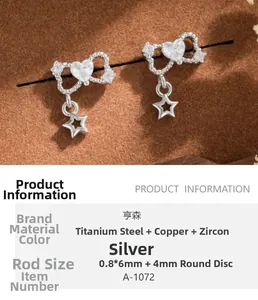 Detail of silver heart and star screw back earring with titanium steel and zircon specs