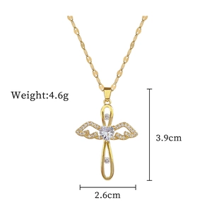Detail view of pink heart and winged cross pendant with precise dimensions and weight
