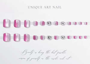 Detail of 24pcs pink cat eye press-on toenails with silver foil and glitter decoration