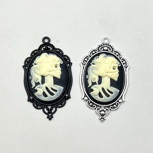 Gothic skull cameo pendants in black and silver oval frames for Halloween DIY jewelry