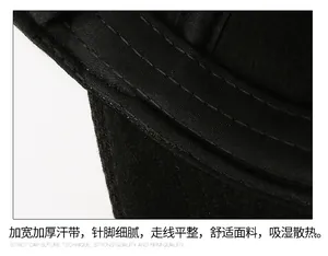 Detail view of thickened sweatband and precise stitching inside the winter baseball cap