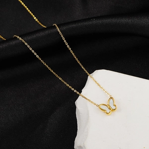 Elegant butterfly necklace in titanium steel with white shell inlay on silk background