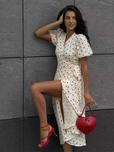 French wrap dress in white cotton with red heart print and matching heart handbag