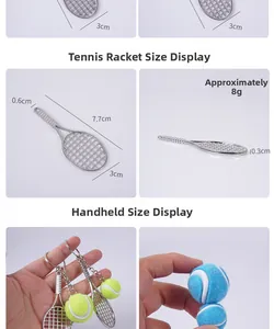 Detailed size view of a 7.7cm mini tennis racket keychain showing the 8g weight and dimensions