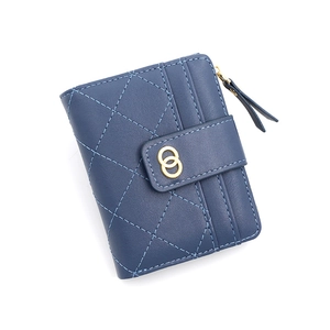Blue quilted leather short wallet for women featuring a gold double ring buckle closure