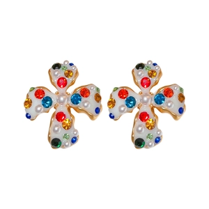 Cross earrings set with colorful gemstones and pearls on a white and gold base