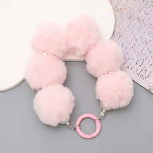 Chic pink faux fur pompom and bead wristlet keychain with round metal clasp for phone