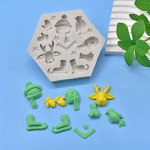 Multi-pattern Christmas silicone mold for cookies and fondant featuring reindeer and snowflakes
