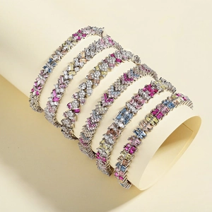 Macro display of assorted colorful zircon tennis bracelets with multi-cut gemstones