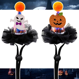 Detail of Halloween pet hats with ghost and pumpkin motifs featuring mesh and sequins