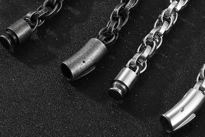 Macro shot of vintage oxidized and polished stainless steel chain link textures and clasps
