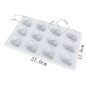 Close-up of 12-cavity silicone mold with precise dimensions 27x17cm for baking