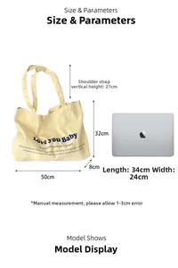 Canvas tote bag size guide with 50cm width and 32cm height next to a laptop for scale