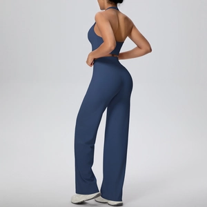 Detail view of navy blue two-piece yoga set with halter top and high-waisted wide-leg pants