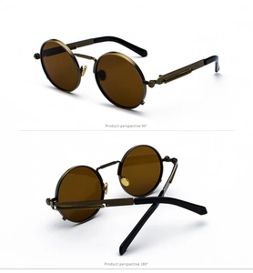 Detail view of steampunk sunglasses with bronze metal spring temples and round brown lenses
