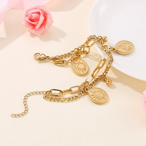 Double-layered stainless steel chain bracelet with sunburst pendants and lobster clasp
