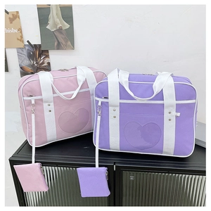Pastel JK uniform bags in pink and purple with heart-shaped clear windows and coin purses