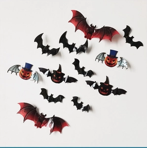 Detailed 3D PVC wall decals featuring black bats and orange pumpkins with silver wings