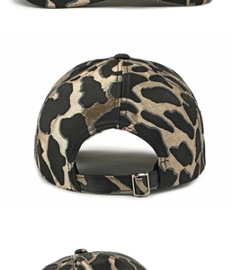 Detail of adjustable metal buckle and leopard jacquard fabric on the baseball cap