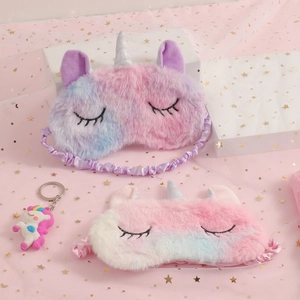 Cute unicorn plush sleep mask in pink purple gradient with a small matching keychain
