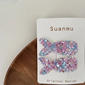 Sparkly sequin mermaid tail hair clips for girls in pink blue and purple colors