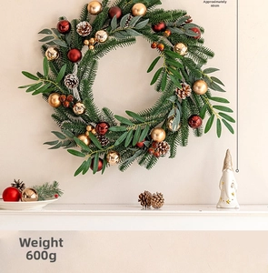 Detailed view of 60cm Christmas wreath with red and gold ornaments and pine cones