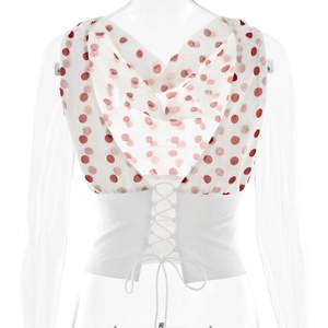 Detailed back view of white chiffon top featuring red polka dots and lace-up waist design