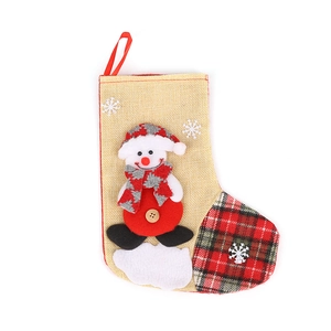 Christmas snowman stocking gift bag with red plaid accents and hanging loop for decoration