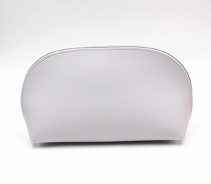 Detail view of large capacity PU makeup bag with litchi texture and secure zipper closure