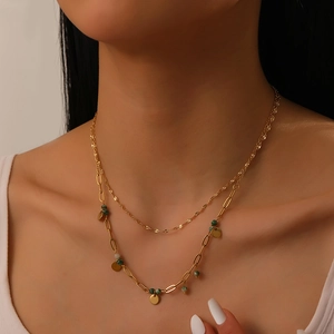 Double-layered gold-plated stainless steel necklace with green beads and round pendants