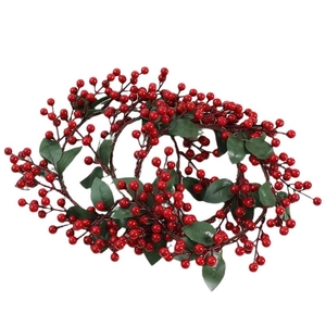 Artificial Christmas wreath featuring vibrant red berries and green pine needles decoration
