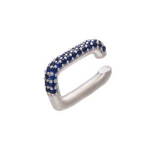 Detailed close-up of a silver ear cuff featuring micro-pave set blue crystals