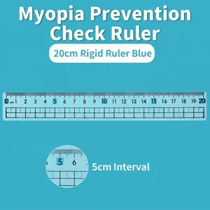 Close-up of 20cm blue anti-myopia ruler with clear grids and 5cm interval markers